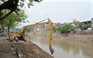 Municipal Corporation workers are busy cleaning Nullah Lai ahead of monsoon season to prevent potential flooding in the area.