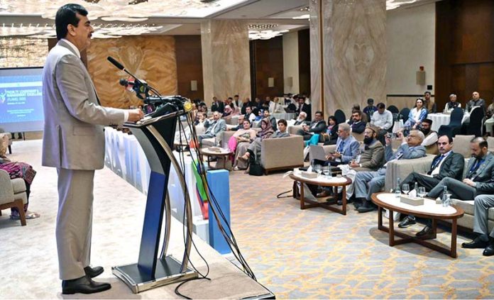 Chairman Senate of Pakistan, Syed Yousuf Raza Gillani, addresses a seminar on 
