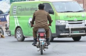 A police personnel rides a motorcycle without a number plate and helmet at Kheam Chowk, a clear violation of traffic laws that warrants the attention of concerned authorities.