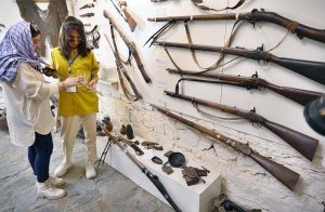 Female visitors taking interest in on display items at Heritage Museum Laspur.