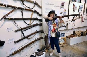 Female visitors taking interest in on display items at Heritage Museum Laspur.