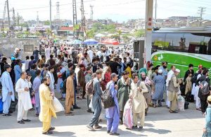 A large number of people arrive at Pirwadai Bus Stand to depart for their hometowns to celebrate upcoming Eidul Azha with their families