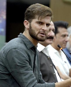 Chairman of the Prime Minister's Youth Programme, Rana Mashhood Ahmed Khan, addresses a press conference during the PM’s Cricket Talent Hunt announcement and signing ceremony with Lahore Qalandars, Team captain Shaheen Shah Afridi is also seen in the picture