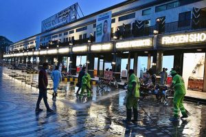 MCL staffers busy cleaning with water during the up gradation of Tollington Market in Provincial Capital.