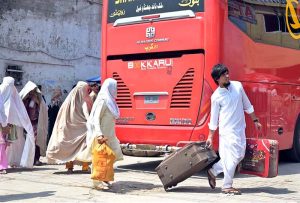 A large number of people arrive at Pirwadai Bus Stand to depart for their hometowns to celebrate upcoming Eidul Azha with their families