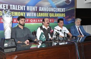 Chairman of the Prime Minister's Youth Programme, Rana Mashhood Ahmed Khan, addresses a press conference during the PM’s Cricket Talent Hunt announcement and signing ceremony with Lahore Qalandars, Team captain Shaheen Shah Afridi is also seen in the picture