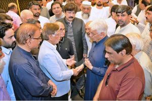 Defence Minister Khawaja Muhammad Asif offering Fateha and expressing condolences on the demise of the wife of Sheikh Riazuddin, leader of the Federation of Chambers of Commerce Pakistan.