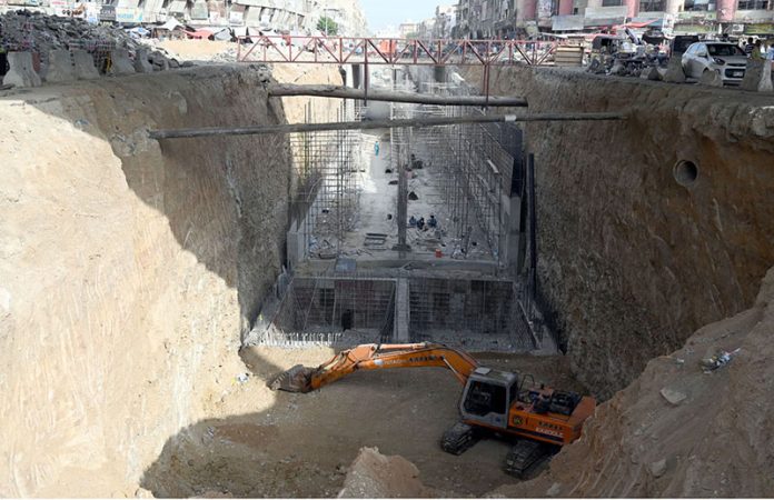 A View of the under-construction underpass at Karimabad, Federal B-Area, as development work in the Provincial Capital