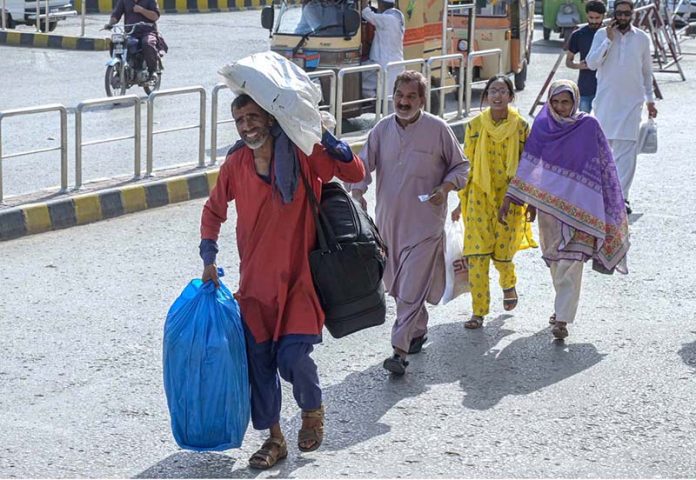 People arrives at Railway Station to depart for their hometowns to celebrate Eidul Adha with their relatives