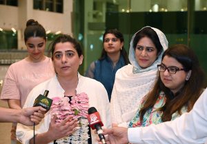 Former Pakistan Women’s Cricket Team captain Sana Mir talking to media as Federal Minister for Information Technology and Telecommunication, Shaza Fatima Khawaja, welcomes. Sana Mir at Islamabad Airport she has become the first Pakistani woman cricketer to be inducted into the ICC Hall of Fame