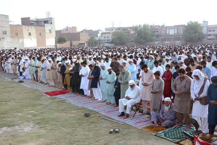 A large number of faithful offering Eidul Azha prayers at Haji Abad Ground