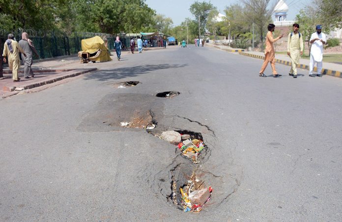 A view of damaged road of Qasim Bagh need the attention of concerned authorities