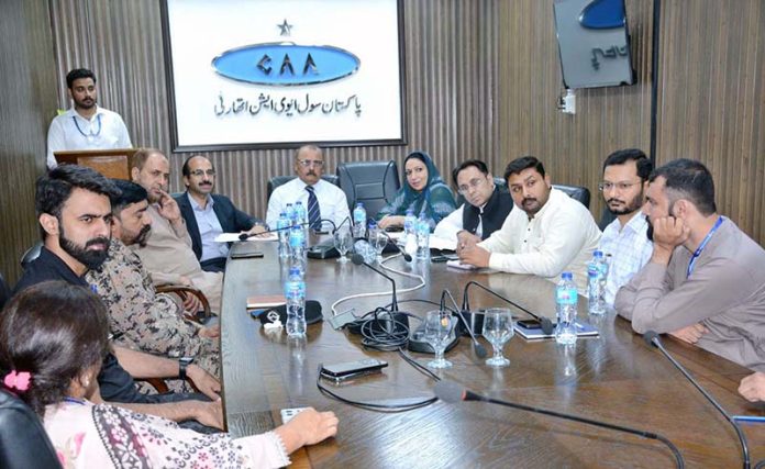 Regional Advisor Federal Ombudsman Shahid Hussain Jillani chairing a meeting during visiting Faisalabad Airport for inspection after public complaints regarding mal-administration and poor service delivery at airport and one window facilitation desk