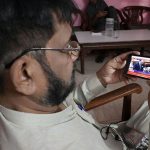 Citizen watching the 2025-26 federal budget live on his Mobile screen