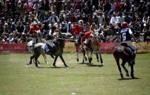 Polo players from Gilgit and Chitral teams in action during a freestyle match at the world’s highest polo ground at the annual Shandur Polo Festival