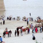 A large number of people arrive at Al-Manzar Picnic Point to enjoy boat rides, camel and horse rides.