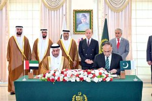 Prime Minister Muhammad Shehbaz Sharif witnessing the signing of an MoU of cooperation between Pakistan and the UAE, signed by Federal Minister for Planning and Development Dr. Ahsan Iqbal and UAE's Deputy Minister of Cabinet Affairs for Competitiveness and Knowledge Exchange H. E. Abdulla Nasser Lootah
