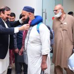 Dr. Tariq Fazal Chaudhary, Federal Minister for Parliamentary Affairs, welcomes the Hajj Pilgrims came back from Saudi Arabia at Islamabad Airport