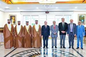 Prime Minister Muhammad Shehbaz Sharif in a group photo with UAE's Deputy Minister of Cabinet Affairs for Competitiveness and Knowledge Exchange H. E. Abdulla Nasser Lootah