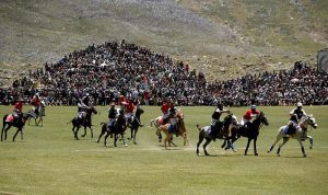 Polo players from Gilgit and Chitral teams in action during a freestyle match at the world’s highest polo ground at the annual Shandur Polo Festival