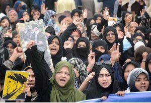 A large number of people take part in a protest rally at MA Jinnah Road against the Israeli and U.S. attacks on Iran.