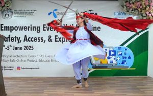 Artist performing kathak classical dance during empowering every child online safety, access, & expression at Business Incubation Center University of Peshawar