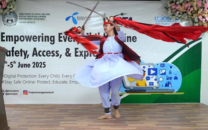 Artist performing kathak classical dance during empowering every child online safety, access, & expression at Business Incubation Center University of Peshawar