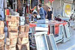 Blacksmith busy sharpen the knife to be used for slaughtering sacrificial animals during Eidul Azha