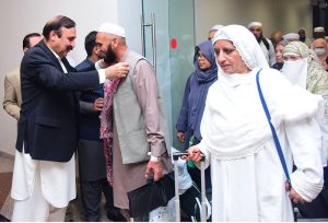 Dr. Tariq Fazal Chaudhary, Federal Minister for Parliamentary Affairs, welcomes the Hajj Pilgrims came back from Saudi Arabia at Islamabad Airport