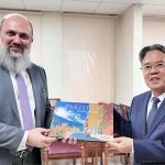 Federal Minister for Commerce Jam Kamal Khan presents the book "Pakistan: Heaven on Earth" to Chinese Ambassador H.E. Jiang Zaidong as a souvenir, highlighting Pakistan's rich tourism potential and symbolizing the spirit of friendship and cultural exchange between the two nations