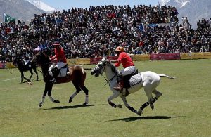 Polo players from Gilgit and Chitral teams in action during a freestyle match at the world’s highest polo ground at the annual Shandur Polo Festival