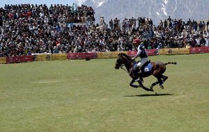 Polo players from Gilgit and Chitral teams in action during a freestyle match at the world’s highest polo ground at the annual Shandur Polo Festival