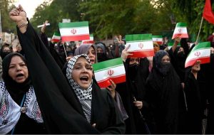 Women activists of Majlis Wahdat-e-Muslimeen hold a protest in support of Iran outside the Press Club