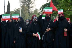 Women activists of Majlis Wahdat-e-Muslimeen hold a protest in support of Iran outside the Press Club