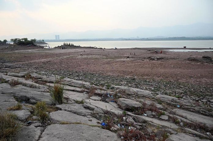 A view of Rawal Lake with significantly reduced water levels, reflecting the impact of ongoing drought conditions in the Federal Capital