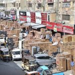 Vendors displaying fridge and deepfreezer outside their shops as demand increased during summer season