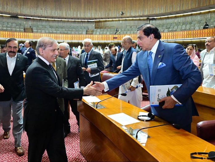 Prime Minister Muhammad Shehbaz Sharif interacts with Members of the National Assembly during the budget session