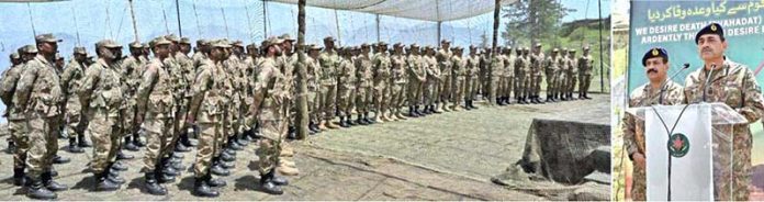 Field Marshal Syed Asim Munir, NI (M), Chief of Army Staff (COAS) addressing the troops while visiting forward positions along the Line of Control (LOC) to celebrate the Eidul Azha with frontline troops