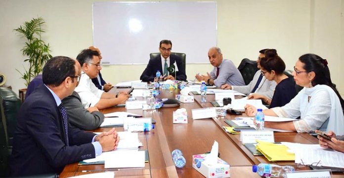 Adviser to the Prime Minister on Privatisation and Chairman Privatisation Commission, Muhammad Ali chairing the Privatisation Commission Board meeting