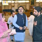 Members of the Balochistan Assembly greet Finance Minister Mir Shoaib Nosherwani after he presented the provincial surplus budget for FY 2025–26