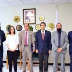 Group photo of UK Trade Envoy Mohammad Yasin with Coordinator to PM on Commerce Rana Ihsaan Afzal, Additional Secretary Commerce Nasir Hamid, and other officials after a meeting on enhancing UK-Pakistan trade relations.