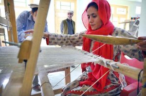 Entrepreneur Fozia Bibi crafts traditional handmade woolen garments from yak and buffalo wool, reflecting Chitral’s rich culture and empowering women through local entrepreneurship.