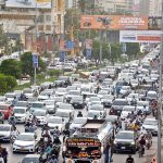A view of massive traffic jam on Shahrah-e-Faisal during peak hours