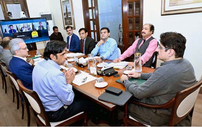 Sindh Chief Minister Syed Murad Ali Shah presides over a meeting to review the progress of the M-6 Hyderabad-Sukkur Motorway project at CM House
