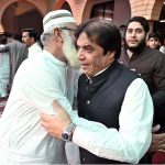 Federal Minister for Railways Muhammad Hanif Abbasi exchanging Eid greetings with people after offering Eidul Azha prayers at Jamia Masjid Al-Aqsa, Satellite Town