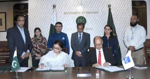 Sabina Qureshi, Additional Secretary for the Ministry of Economic Affairs, and Dinesh Raj Shiwakoti, ADB Project Head, signing Women Inclusive Finance Sector Development Program.