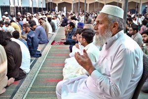A youngster offering dua after Eidul Azha prayers at Jamia Masjid Al-Aqsa, Satellite Town