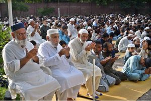 A youngster offering dua after Eidul Azha prayers at Jamia Masjid Al-Aqsa, Satellite Town