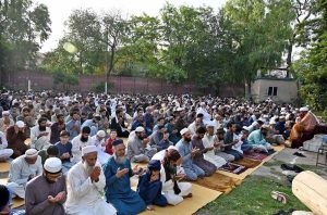 A youngster offering dua after Eidul Azha prayers at Jamia Masjid Al-Aqsa, Satellite Town