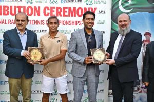 Federal Minister for Commerce Jam Kamal Khan distributes prizes and souvenirs during the ceremony of the 1st Emerging Pakistan National Ranking Tennis Championship 2025, organized by the Pakistan Tennis Federation at the PTF Tennis Complex